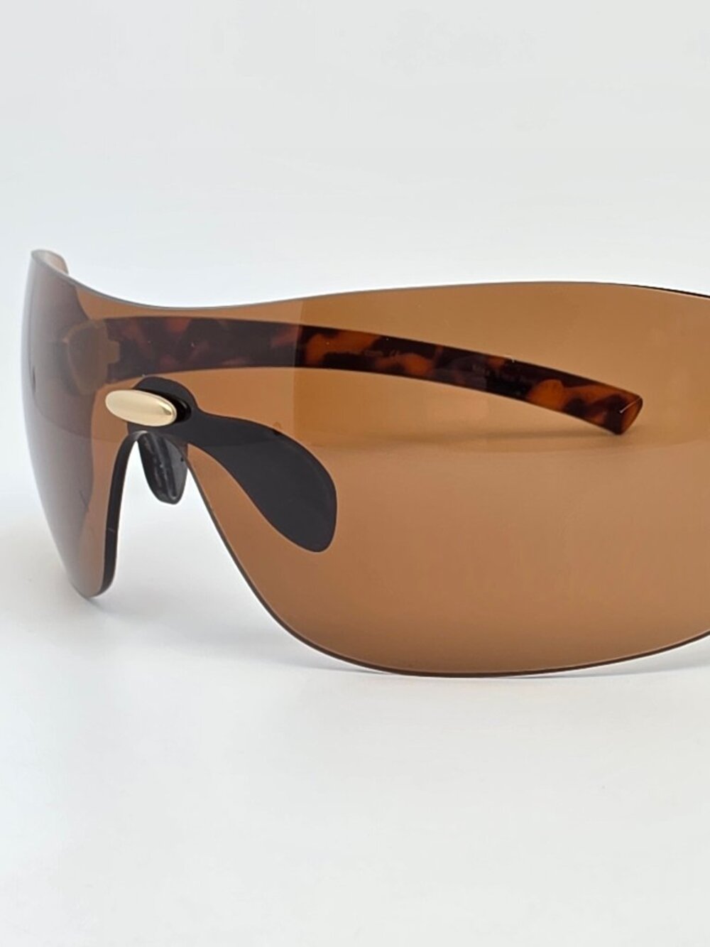 Sundog Paula Creamer Aura Tortoise Frame Brown Lens Rimless Golf Sunglasses